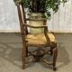 20th-century armchair in beech with a straw seat in Louis XV style.