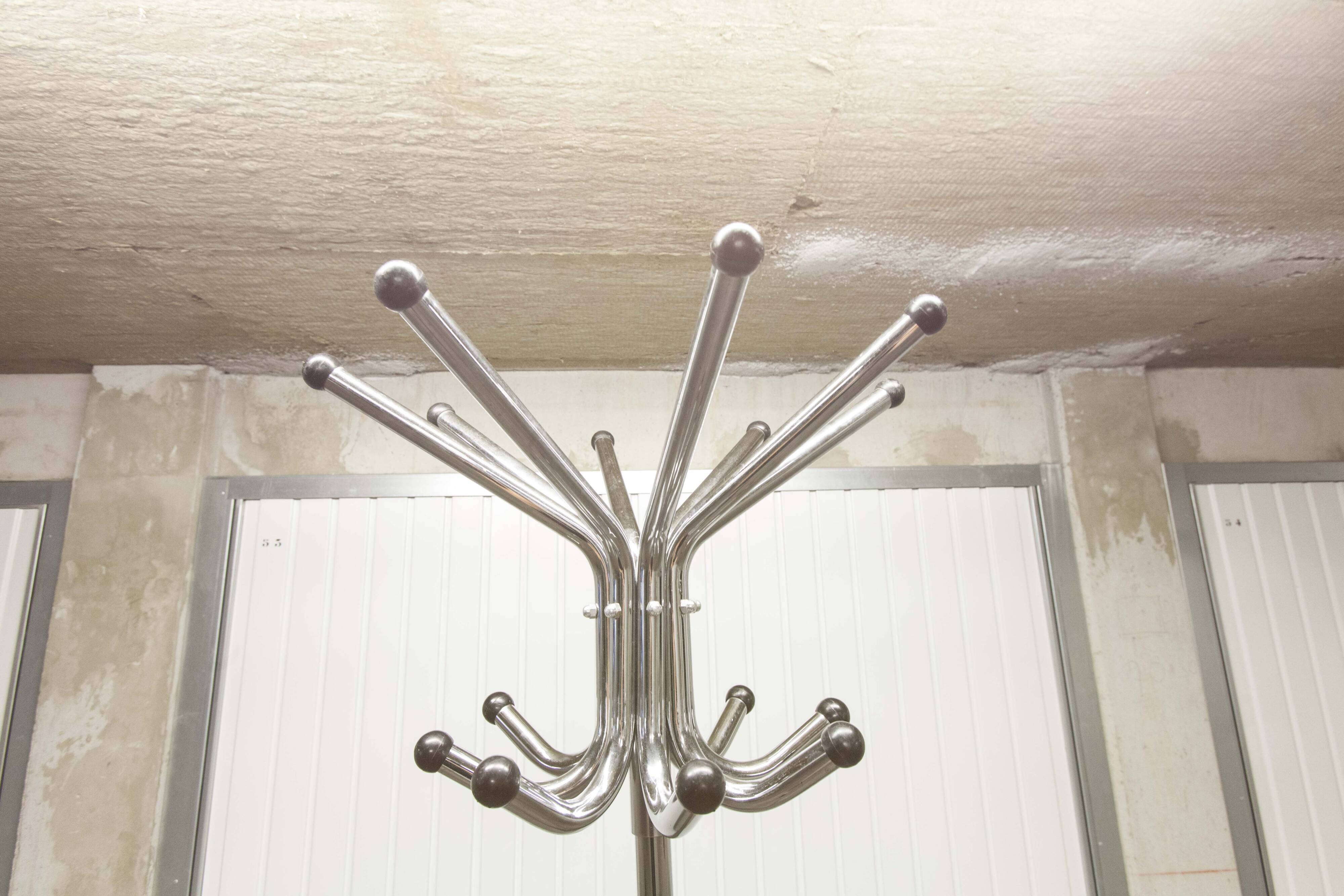 1960 parrot coat rack with 16 hooks, industrial chrome metal, rotating.
