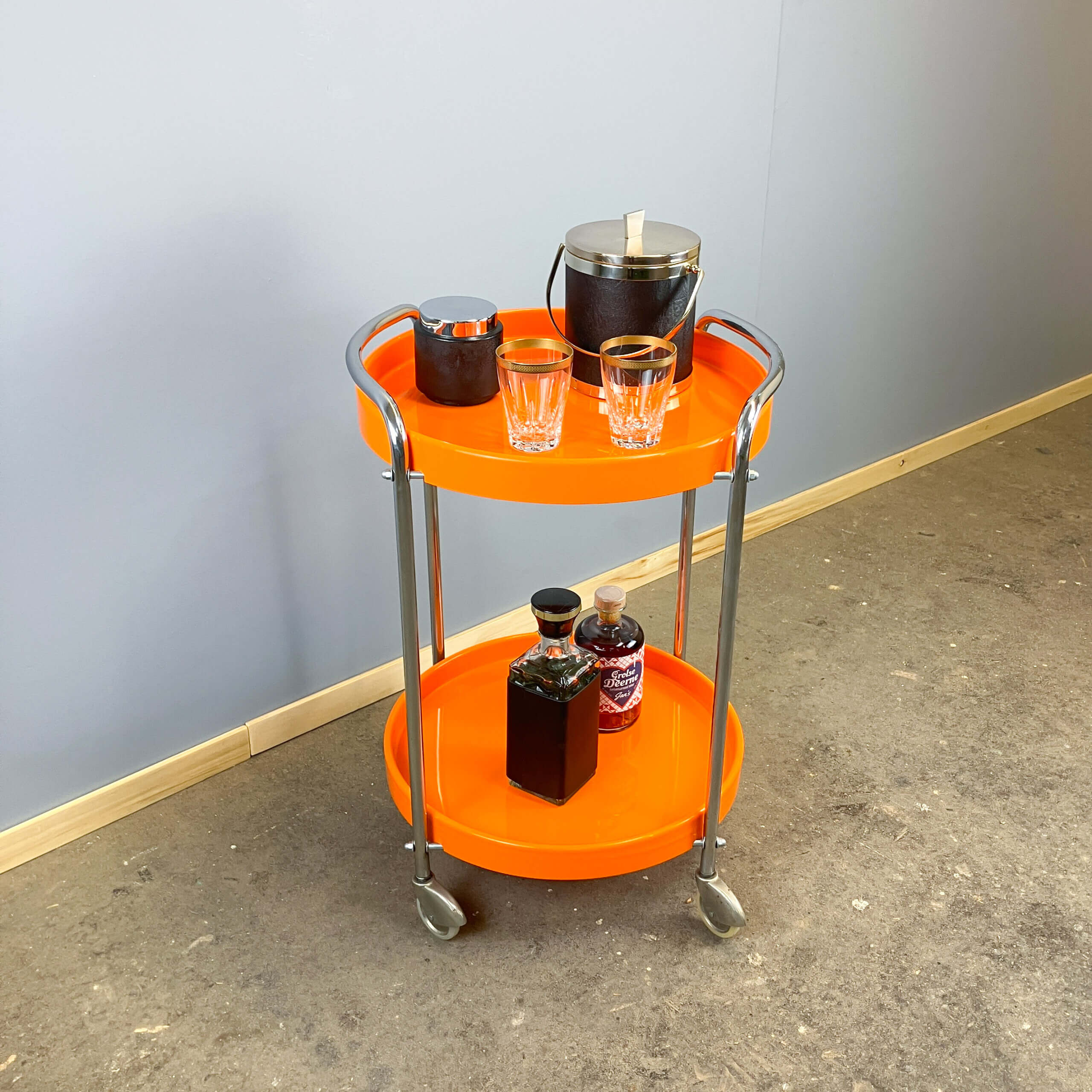 Space Age serving trolley, chrome and orange plastic trays, 1970s