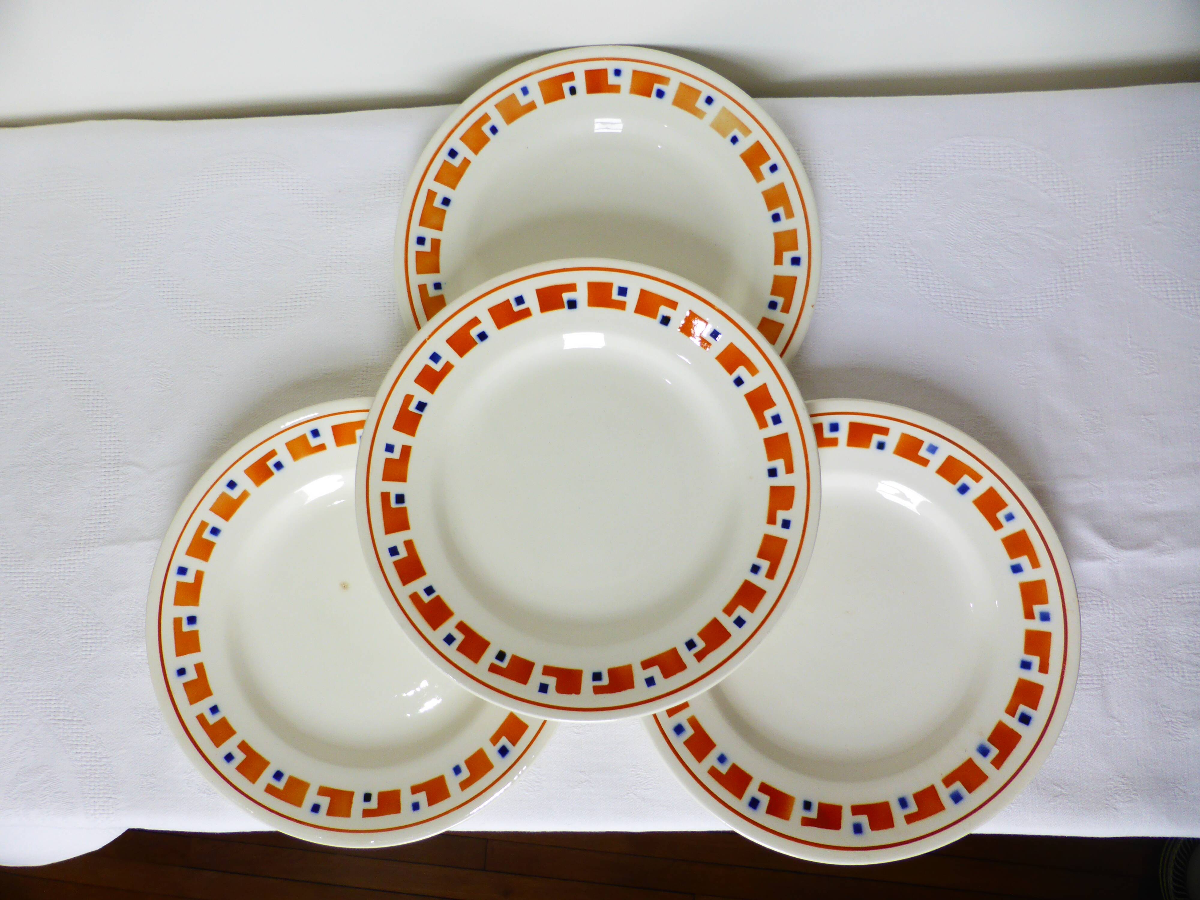 4 flat plates in iron earth from Salins, Lucette model 210809