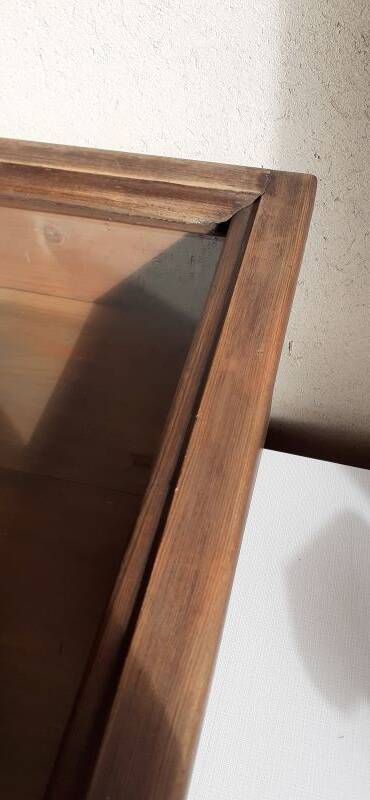 Old sloping pine display case