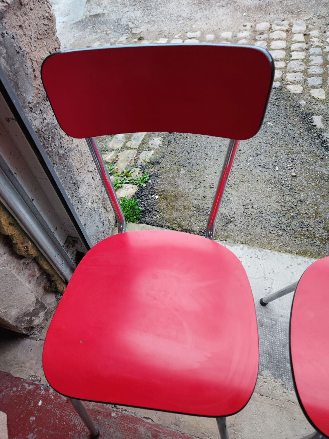 6 red and chrome Formica chairs