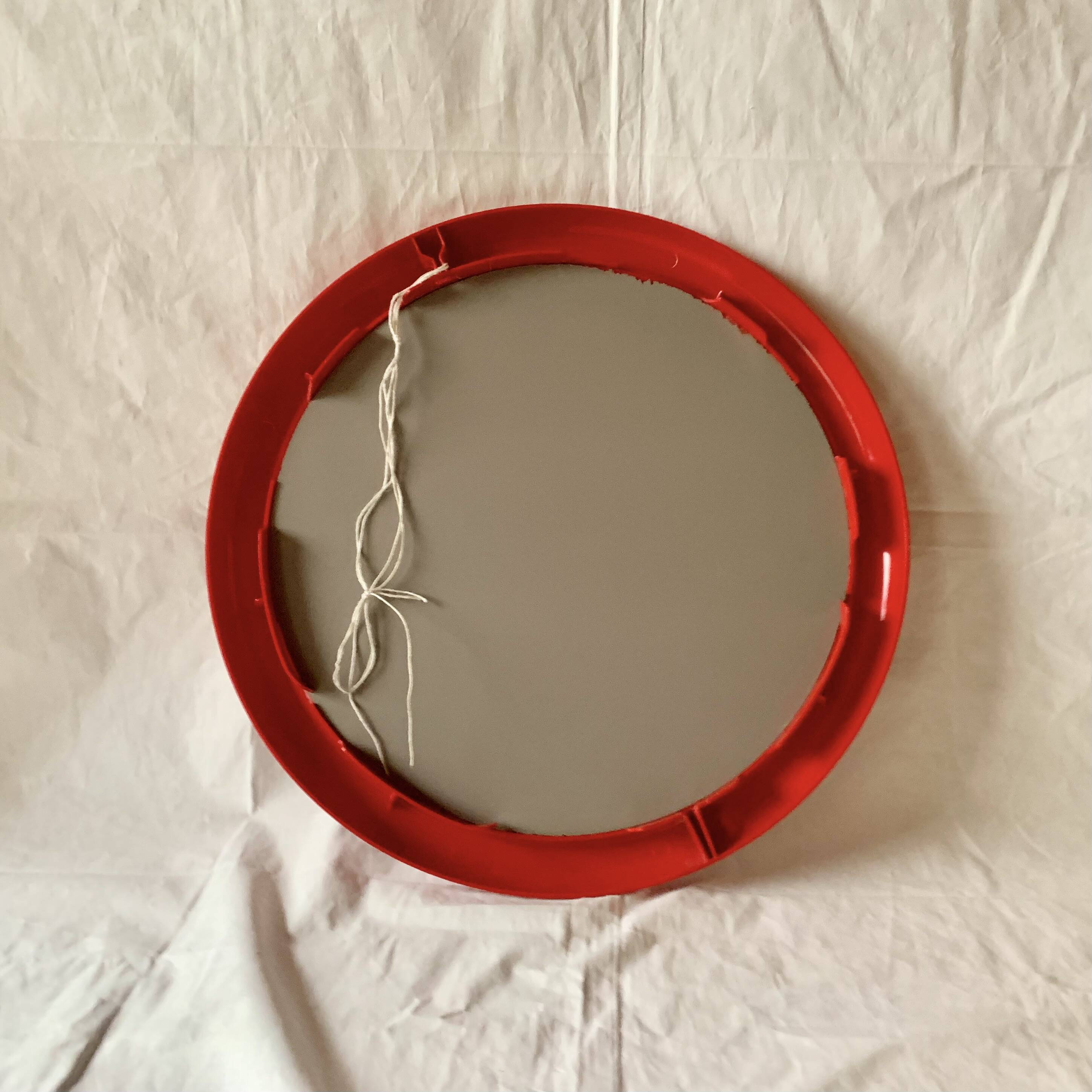 Vintage round red plastic mirror