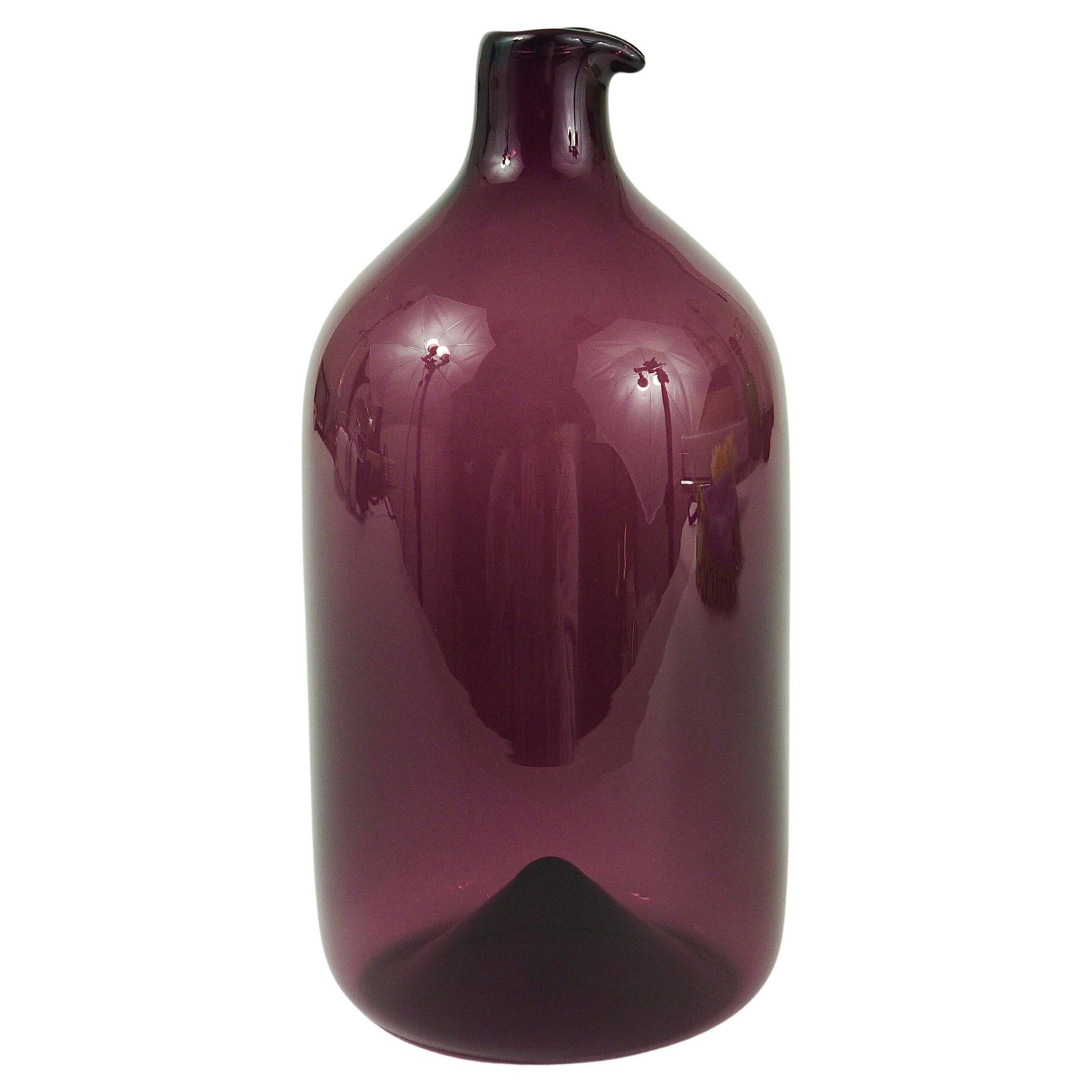Glass vase signed Purple Timo Sarpaneva Pullo Bird Bottle, Iittala, Finland.