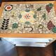 New oak storage furniture with a signed artisanal mosaic top.