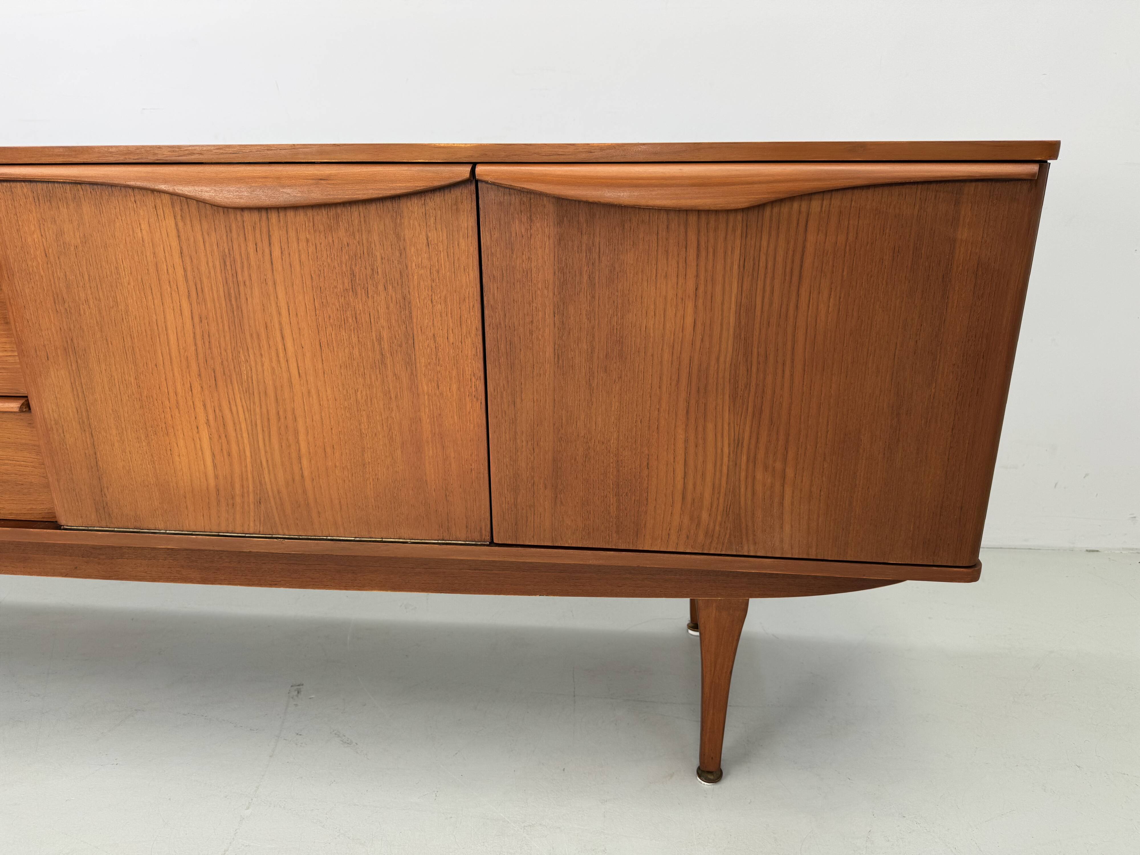 Beautiful and unique Stonehill sideboard from the 1960s made of teak wood.
