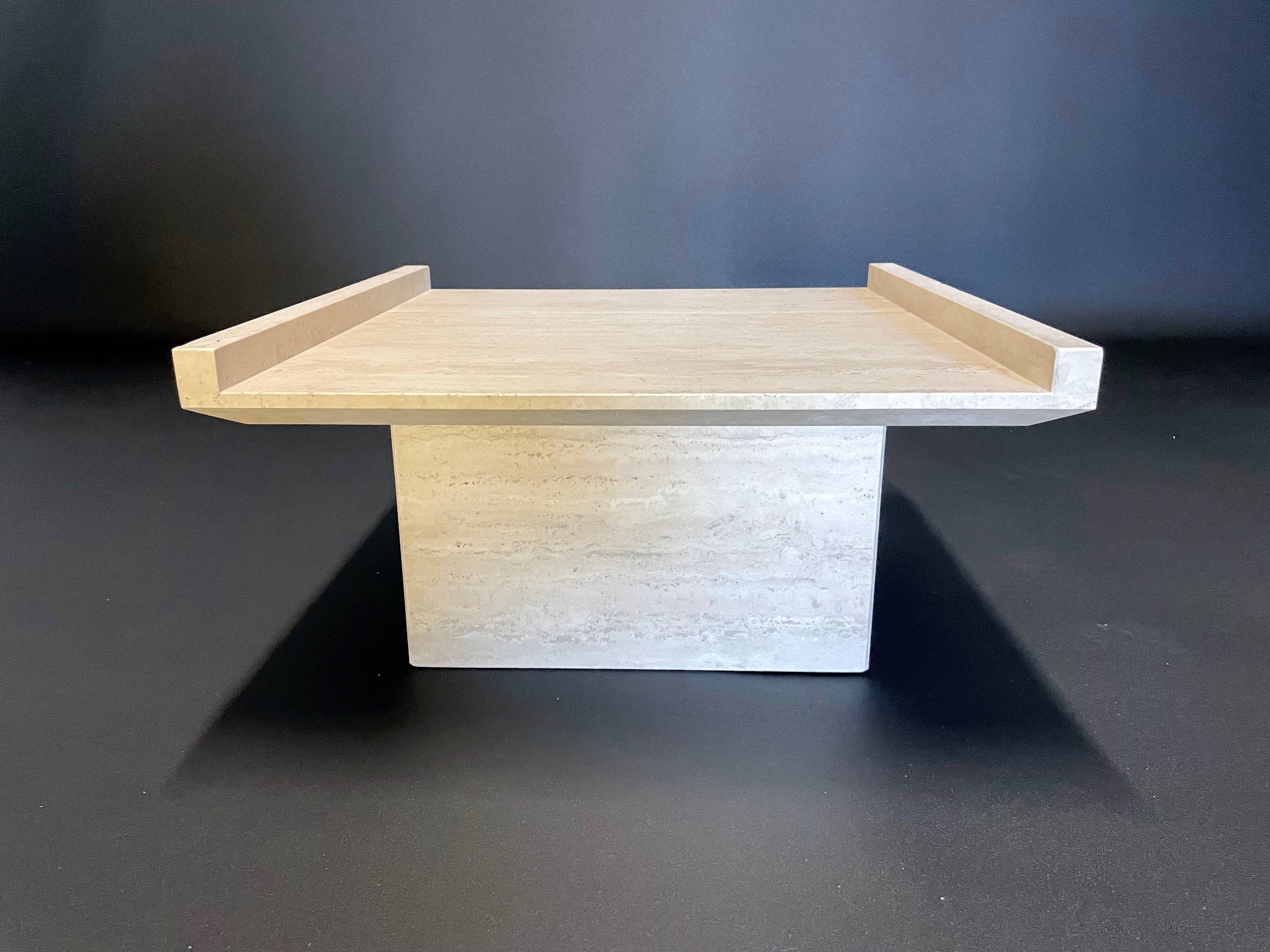 Square travertine coffee table by Claude Berraldacci. 1990s. France.