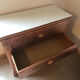 Old chest of drawers restored golden copper color