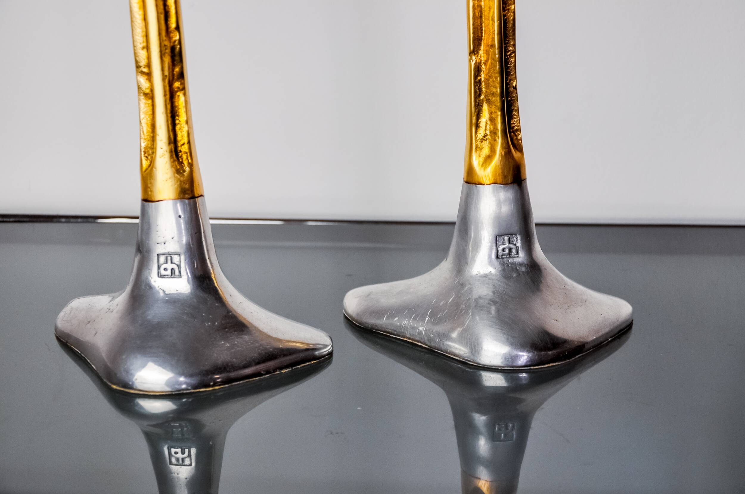 Pair of Brutalist candlesticks by David Marshall, bronze and aluminum, Spain, 1970