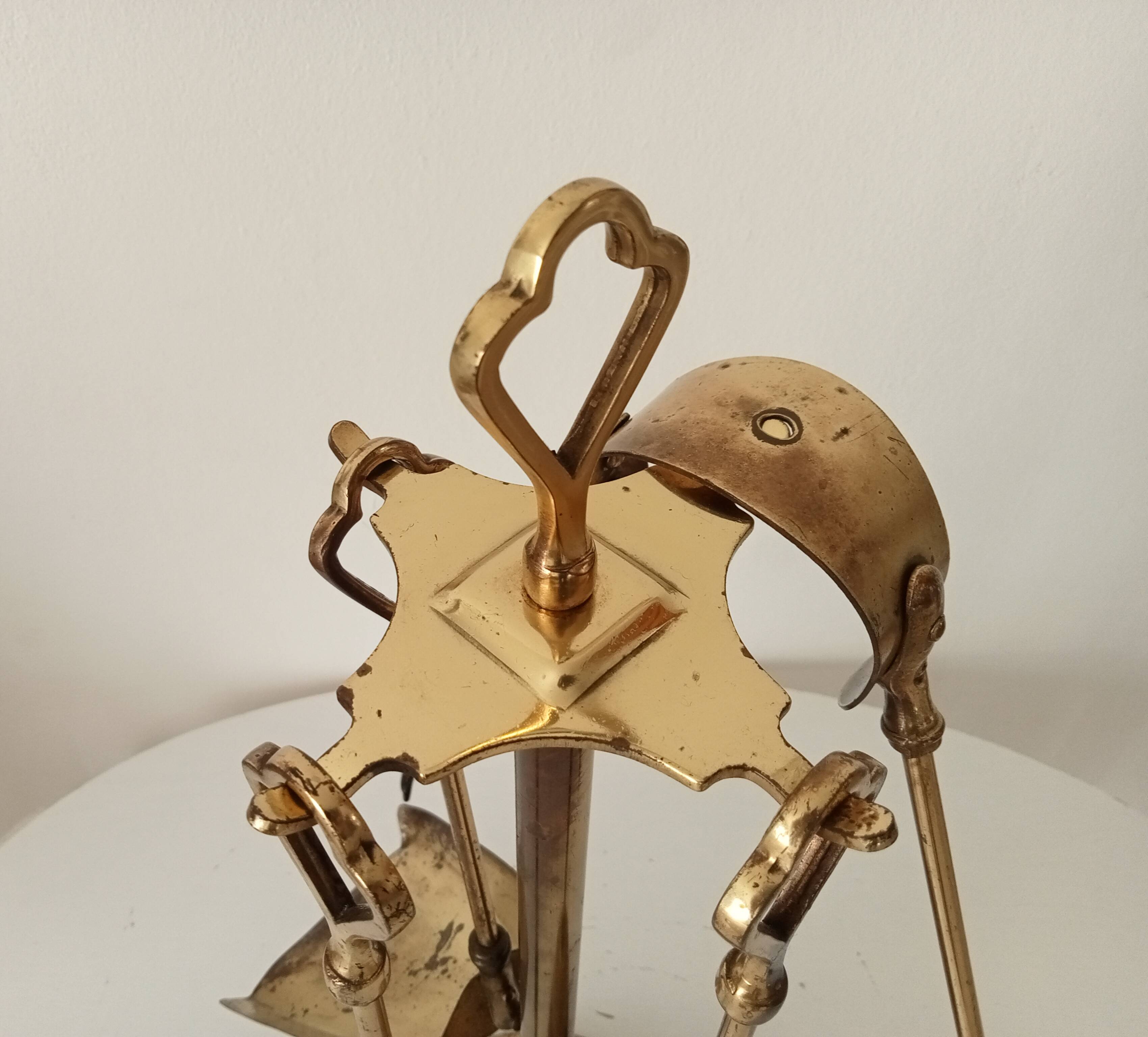 Old brass fireplace servant