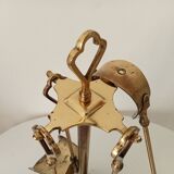 Old brass fireplace servant