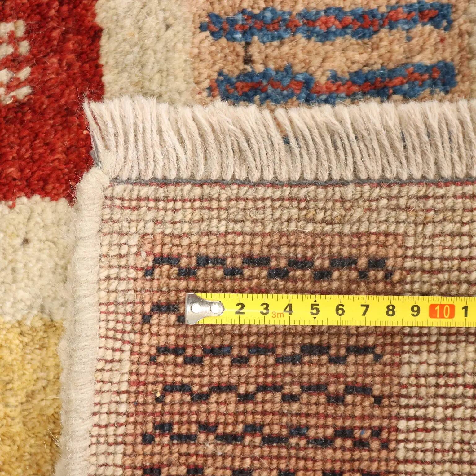 Ancient Asian wool rug, thick knotting, handmade 35 x 61 in.