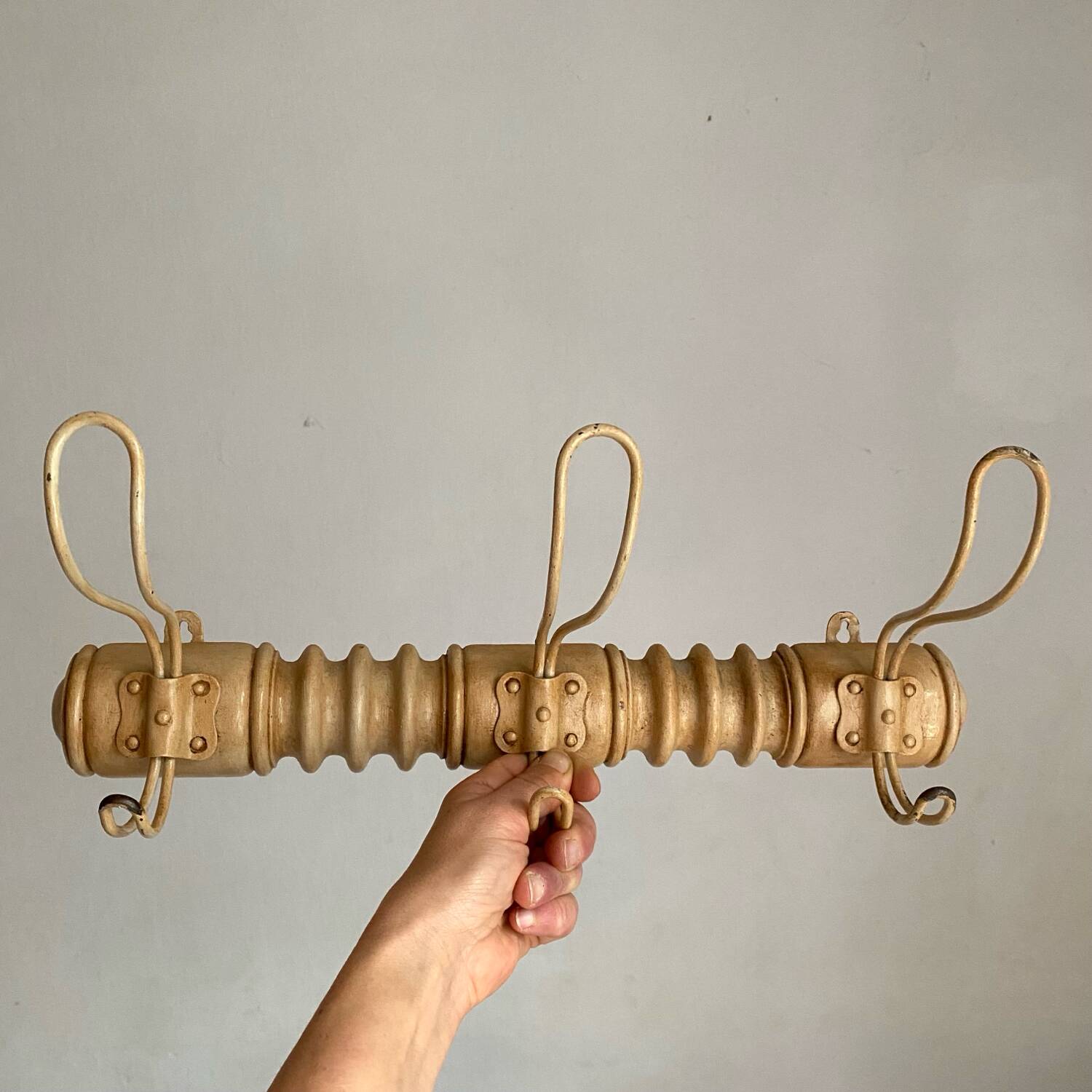 Turned wood wall coat rack