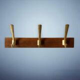 Vintage wooden wall-mounted coat rack with 3 golden cast aluminum hooks