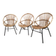 Trio of vintage rattan shell armchairs with metal legs, antique wicker seating furniture