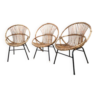 Trio of vintage shell armchairs in rattan metal legs, antique wicker seats furniture