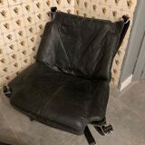Leather Falcon armchair and footrest