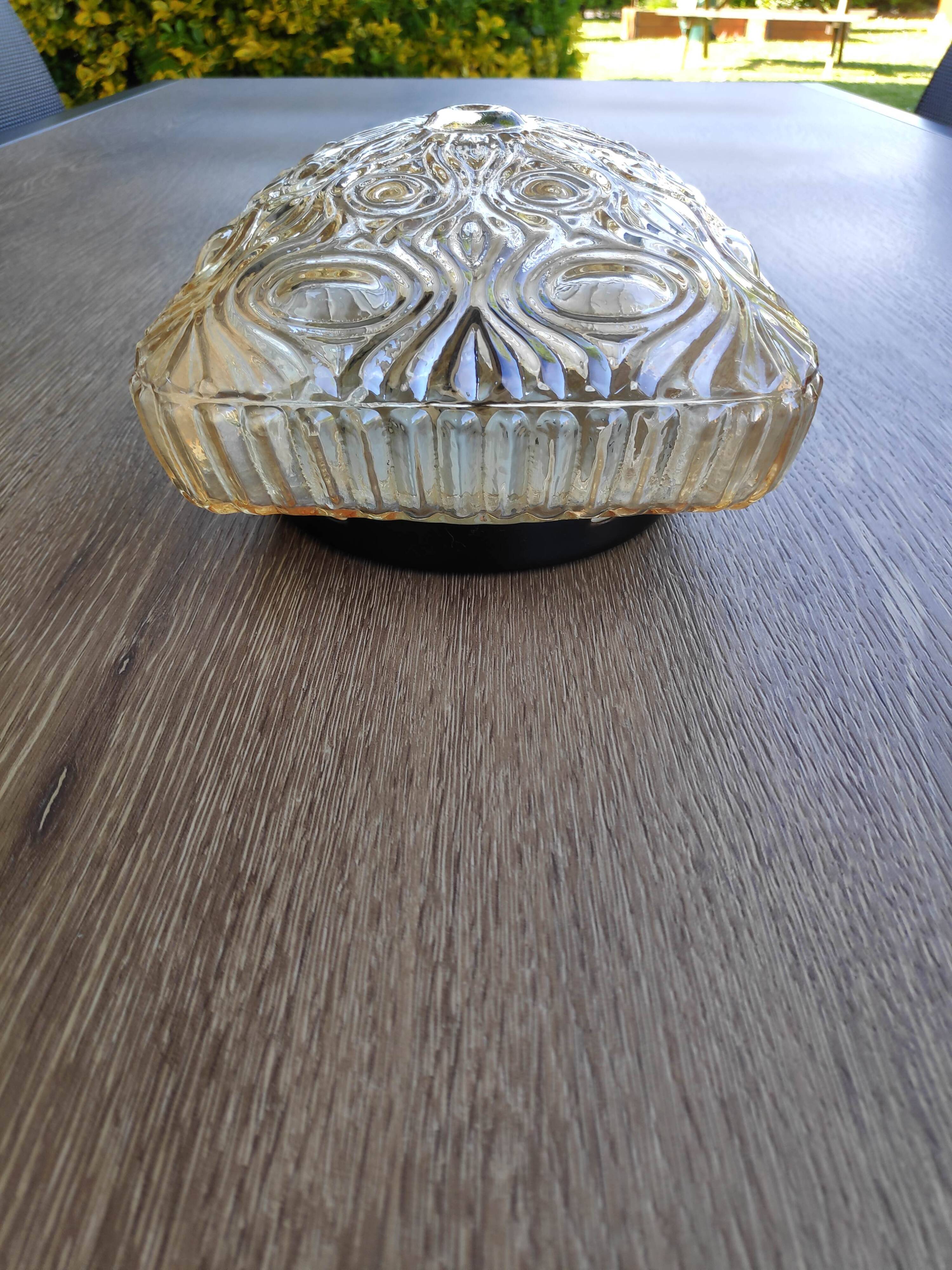 Amber ceiling light in thick glass