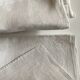 Tablecloth and 8 damask linen napkins embroidered RT circa 1900.