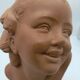 Bust young smiling girl. Circa 1900. Art Deco. Signed.