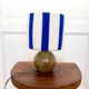 Vintage table lamp with pyrite sandstone base and striped wool lampshade