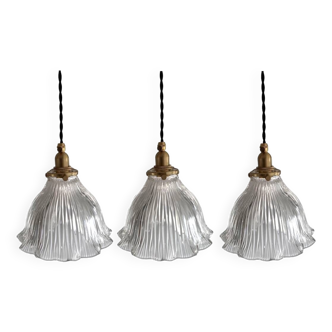 Set of three vintage holophane glass pendant lights