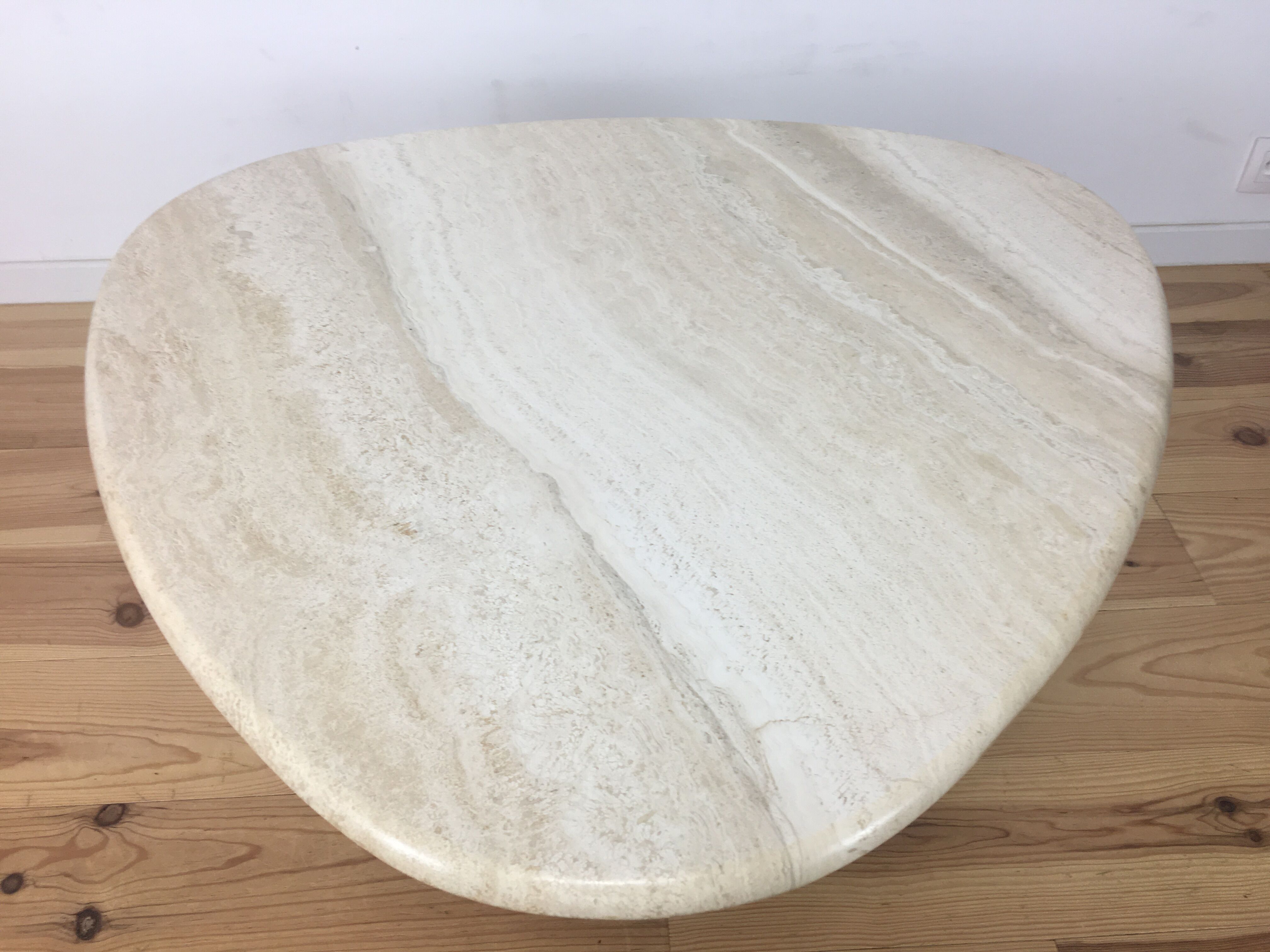 Travertine coffee table goes up and down to jack