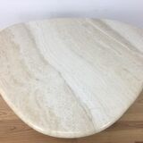 Travertine coffee table goes up and down to jack