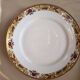 Porcelain service MG early 20th century 8 plates and 1 compote.
