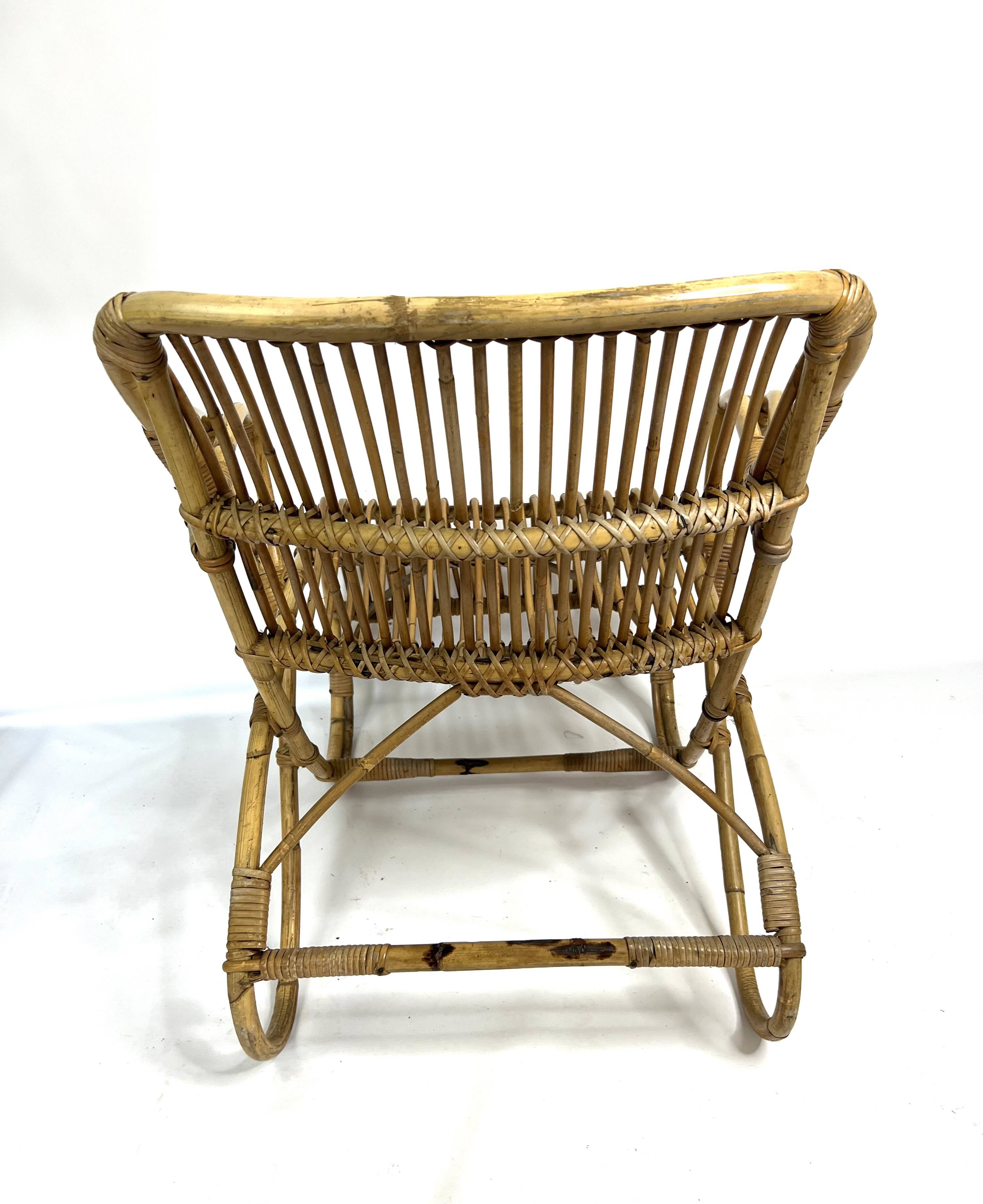 Vintage rattan armchair from the 1960s-1970s.
