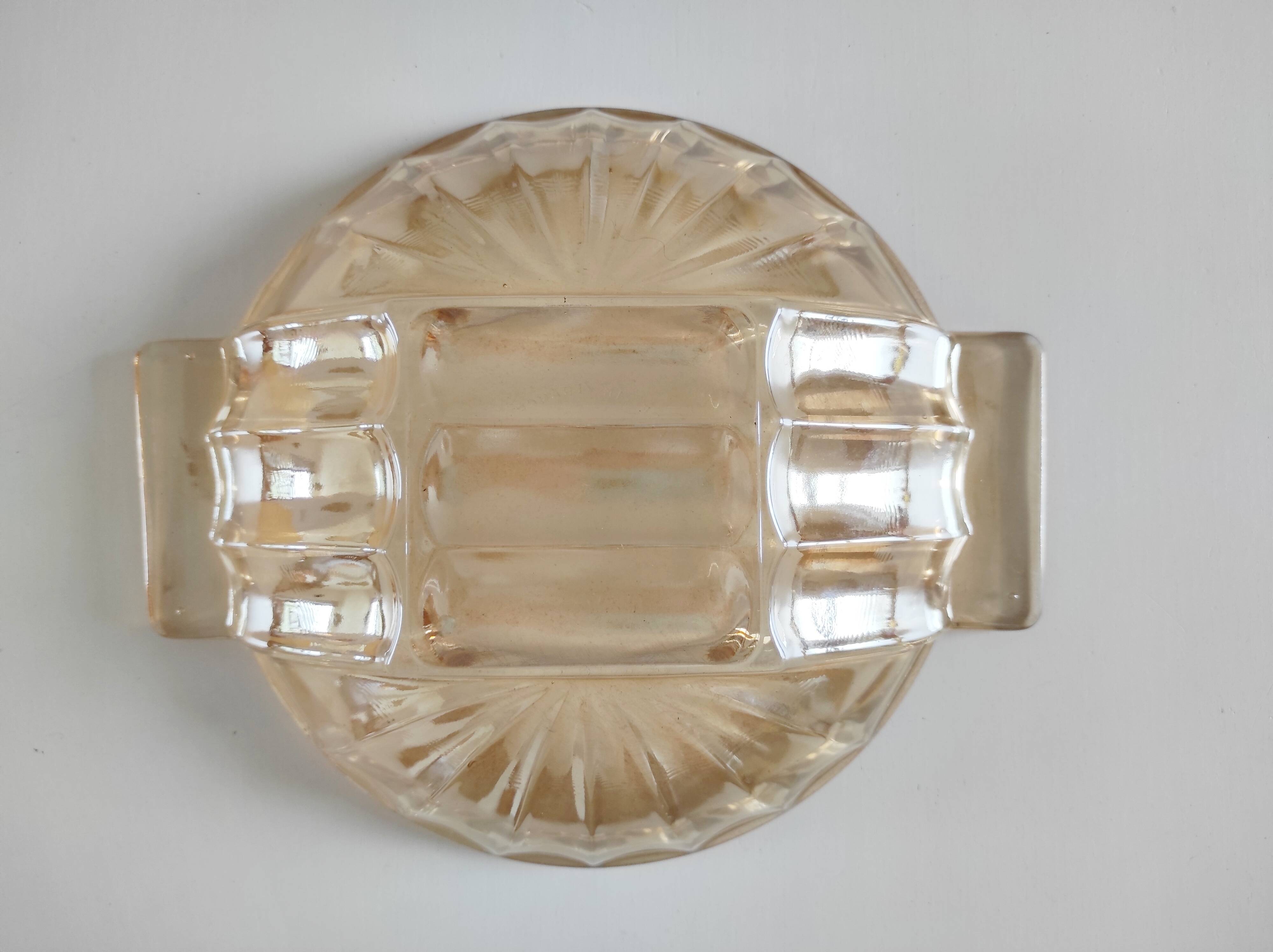 Iridescent orange glass cup