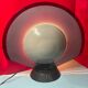 Lampe tournante Gong de Bruno Gecchelin, Arteluce Italie design