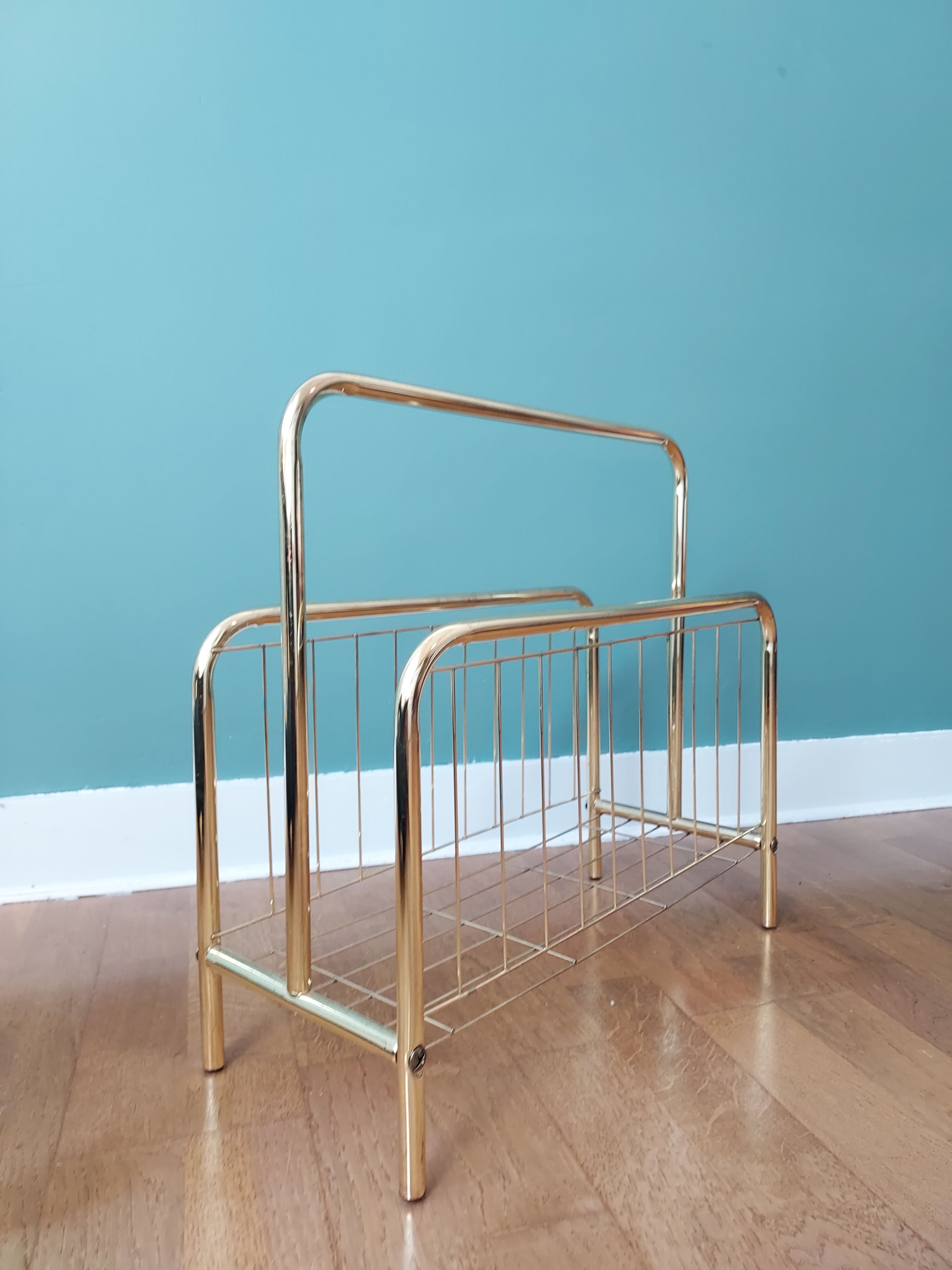 Gilded metal magazine door