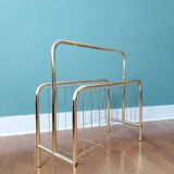 Gilded metal magazine door