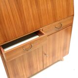 Vintage secretary with drawers, drop-down and doors from the 1960s.