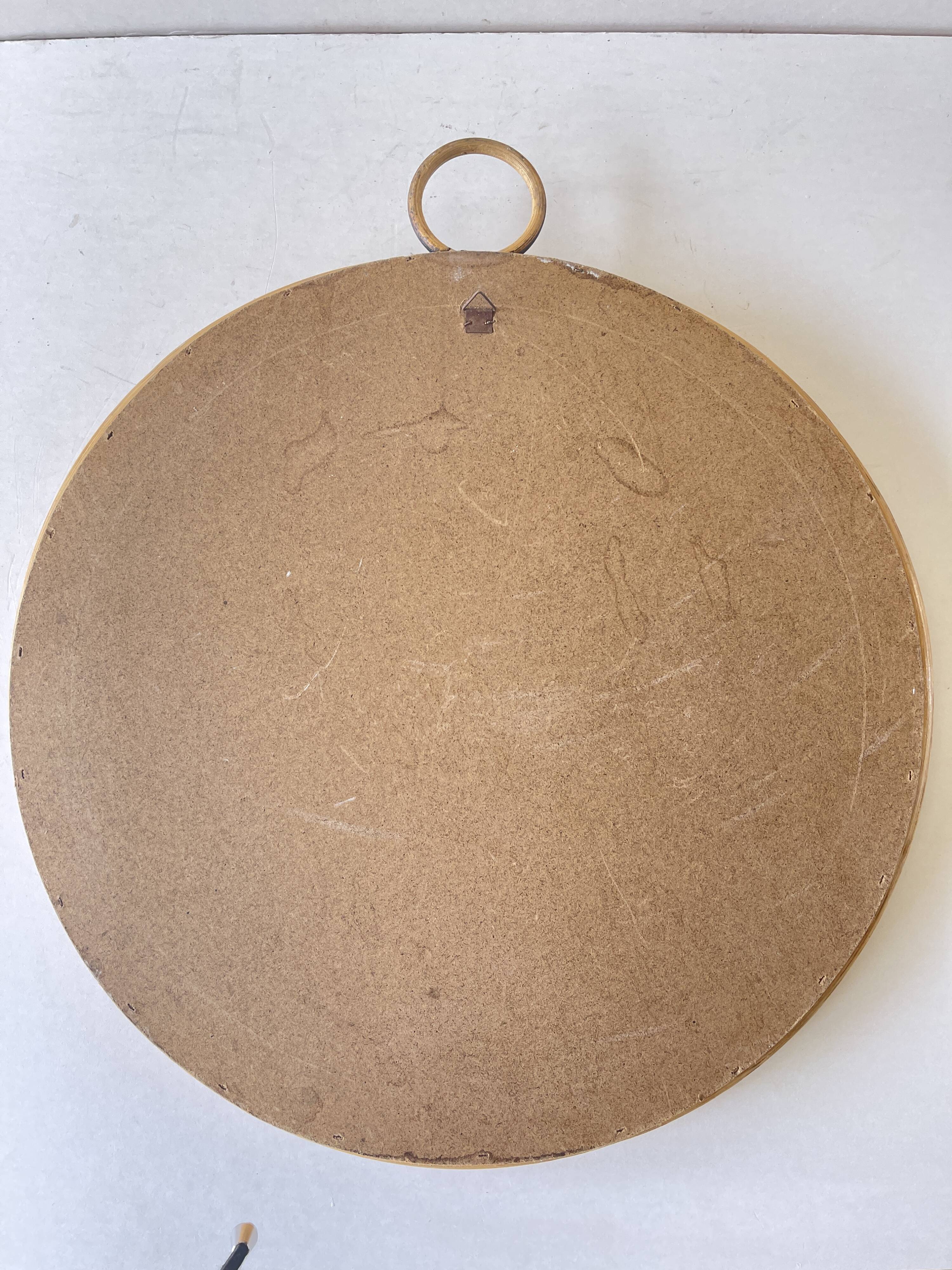 vintage round rattan mirror