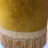 Velvet and fringed ottoman