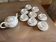 Very elegant teapot and its 8 cups.