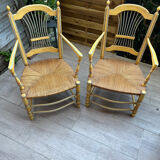 Pair of vintage patinated armchairs