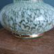 Green speckled glass vase from Clichy with gold threads.