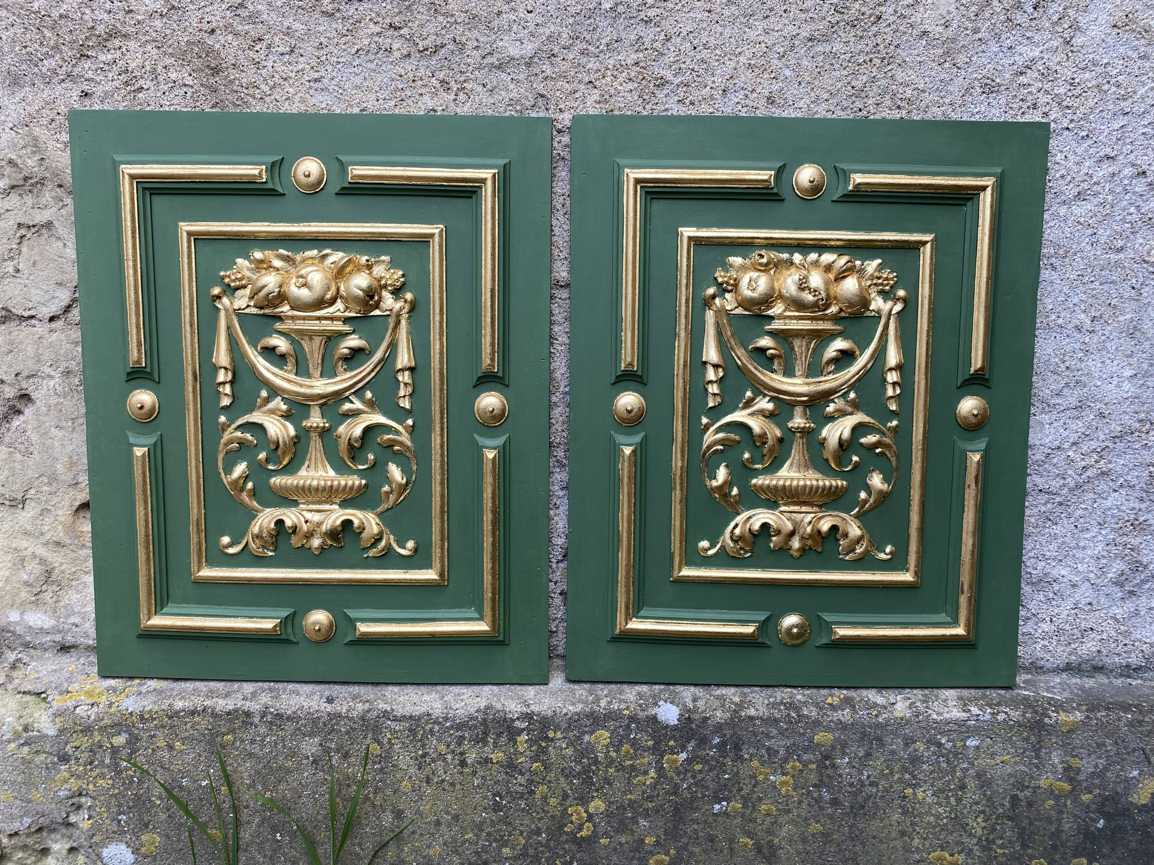 Pair of carved and leaf-gilded wooden panels