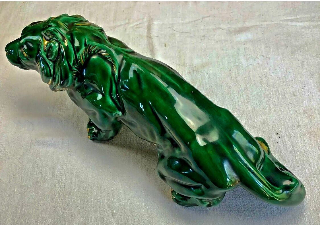 Art Deco lion statue cracked St Clement