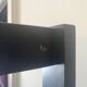 Large vintage bookshelf in solid black wood, Scandinavian style.