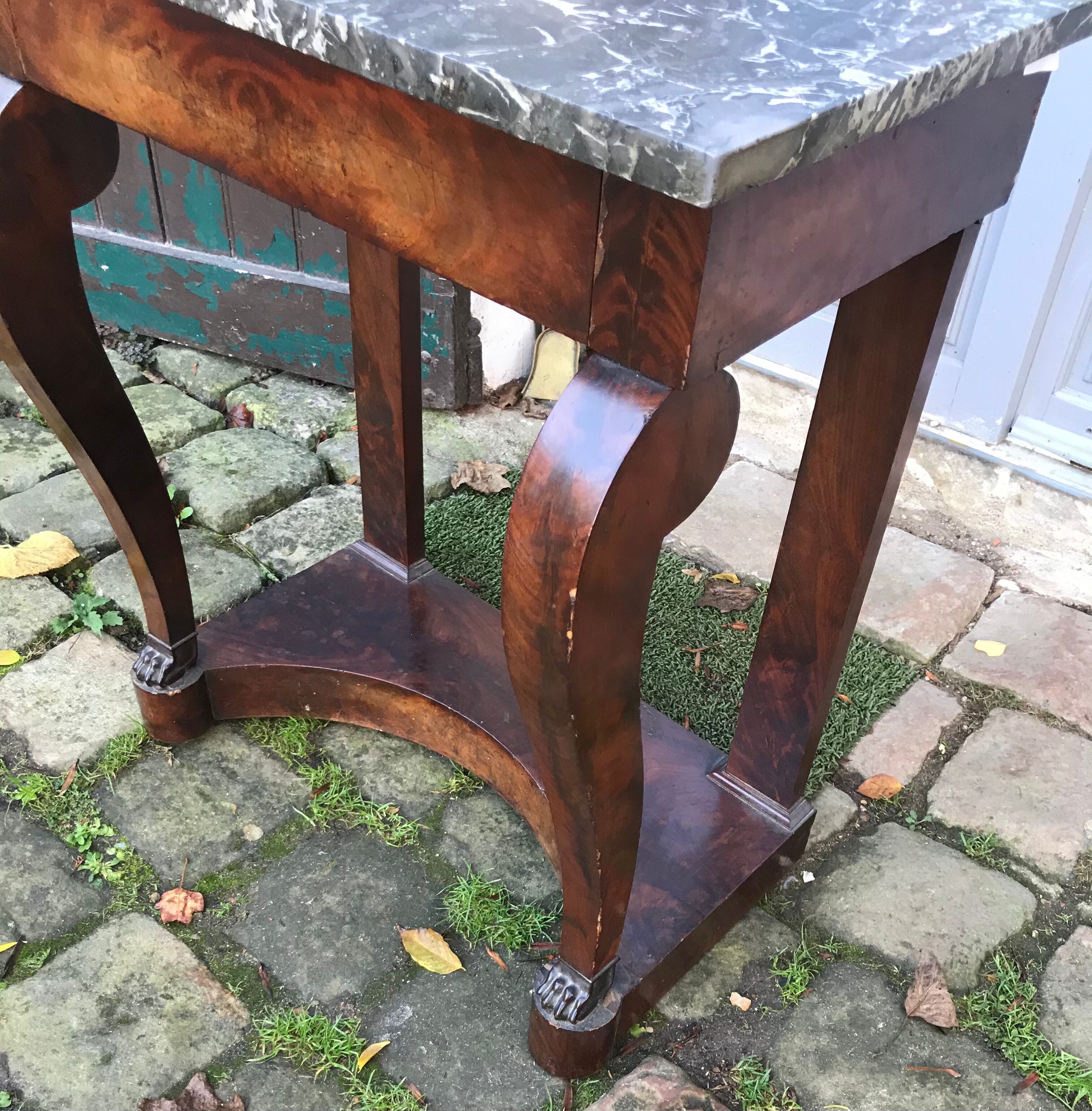 Empire-style console with marble and mahogany claws