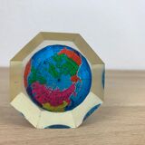 Globe paper press under resin