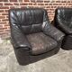 Pair of patinated leather club armchairs