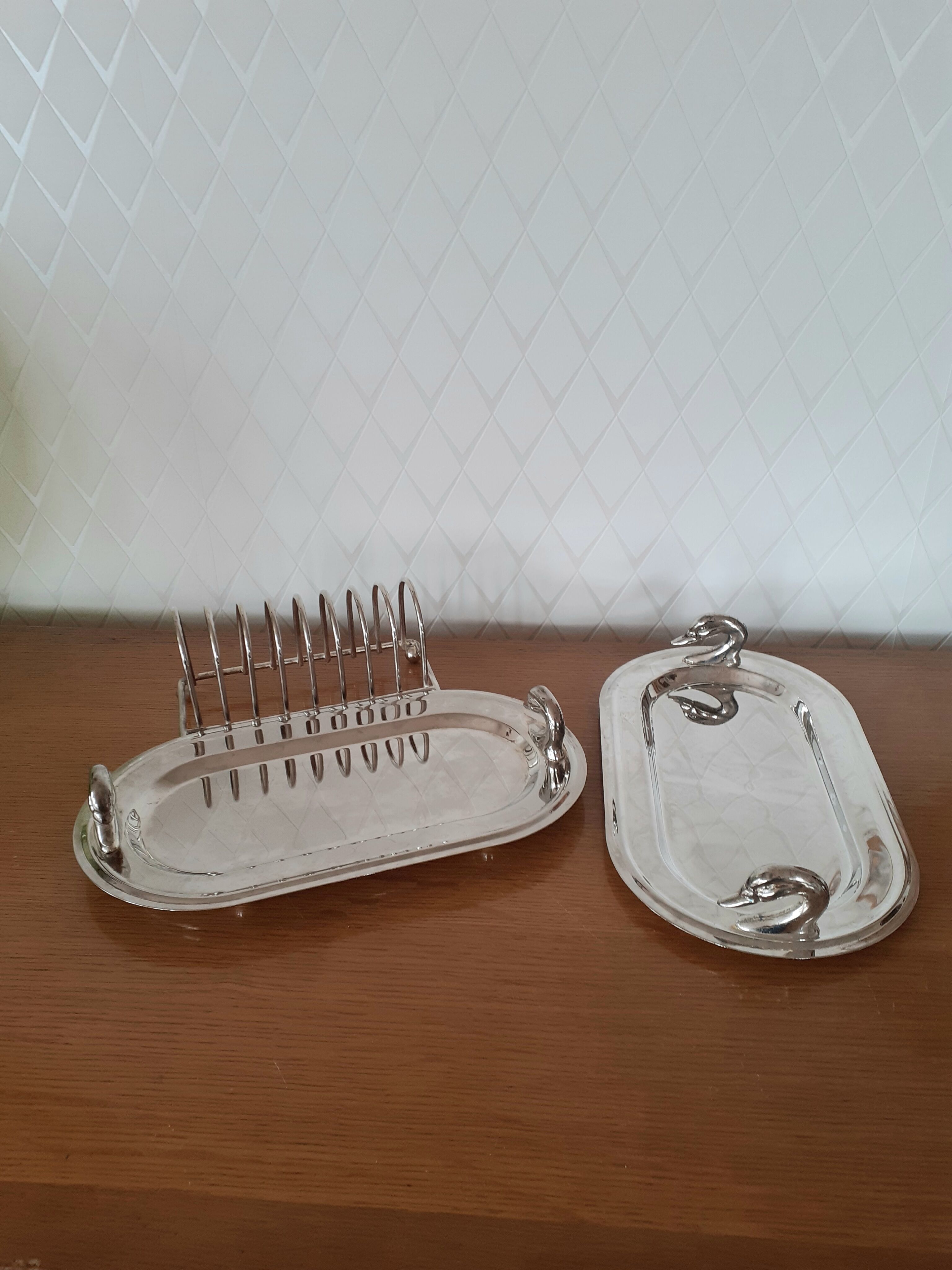 Two foie gras dishes and their toast holder