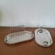 Two foie gras dishes and their toast holder