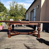 1910s Jacobean style solid oak extending drawer dining table