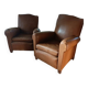 Paire de fauteuils club cuir